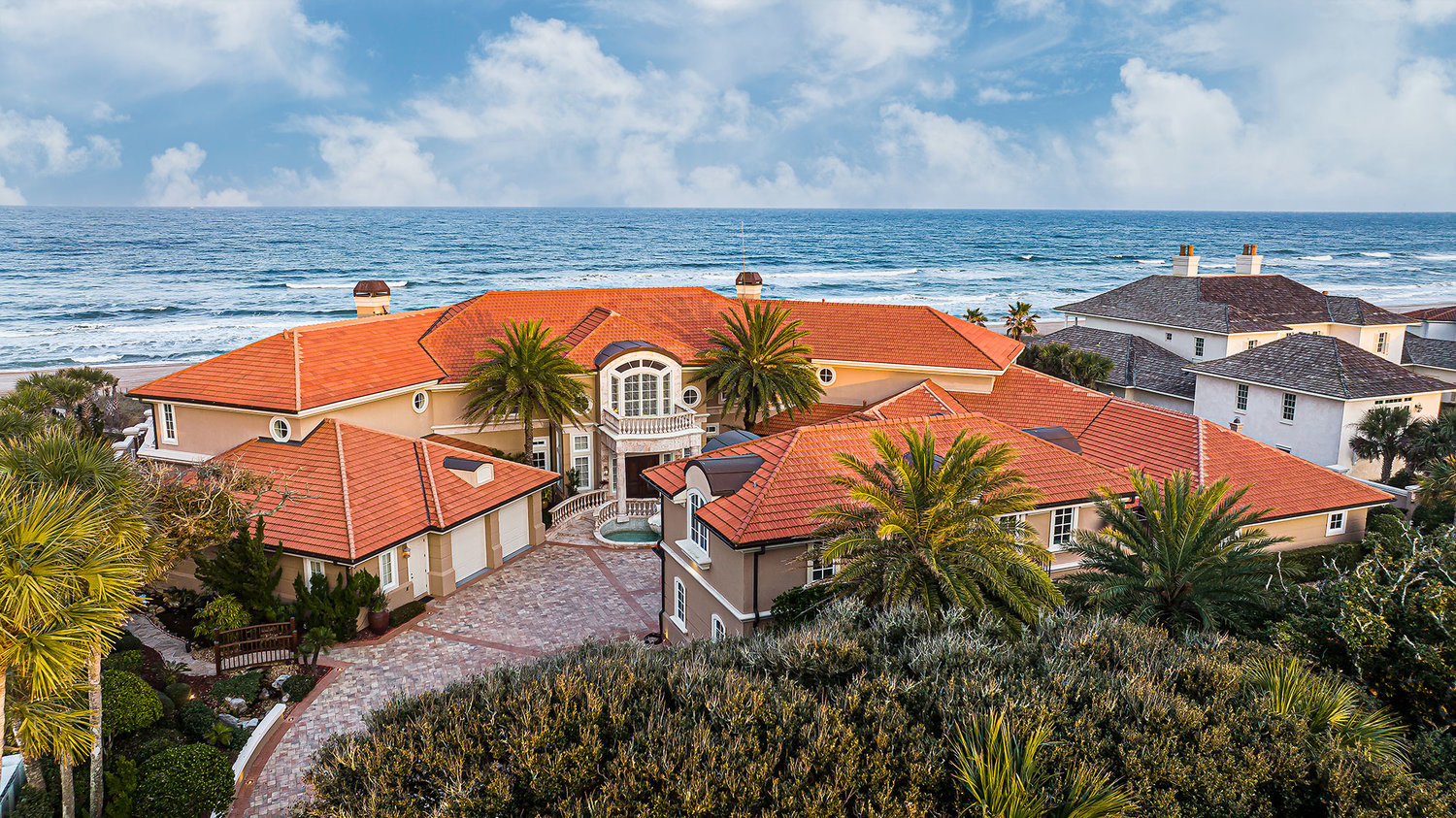 Douglas Elliman’s influence on the local luxury real estate market has already taken hold. This oceanfront estate is currently on the market for $16.9 million.